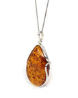 Baikalla Jewelry Gemstone Ring Baikalla™ Sterling Silver Elegant Amber Pear- Cabochon Cut Pendant